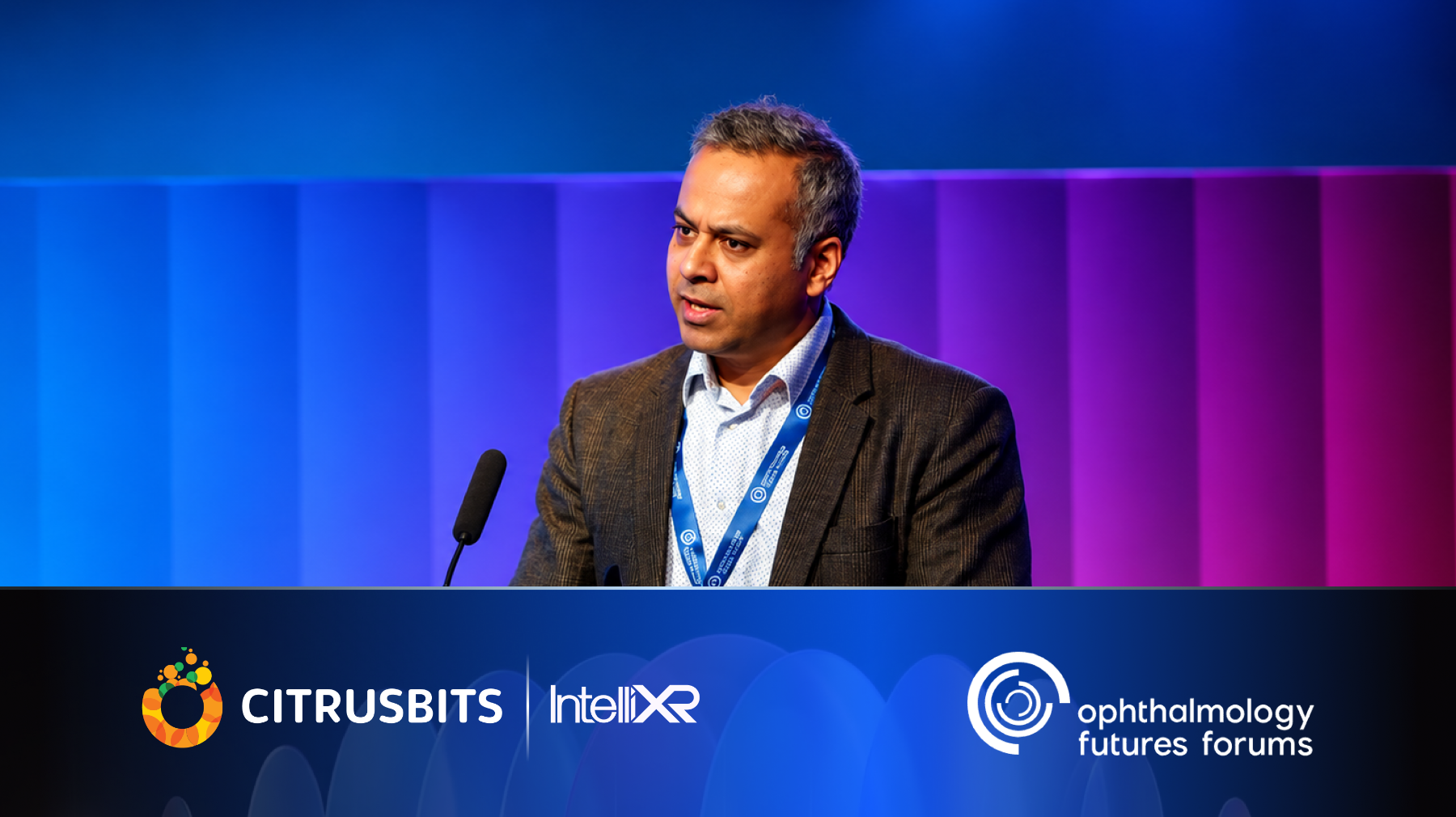 Gaurav Malik speaking at Ophthalmology Futures European Forum 2026, with CitrusBits, IntelliXR and Ophthalmology Futures Forums logos